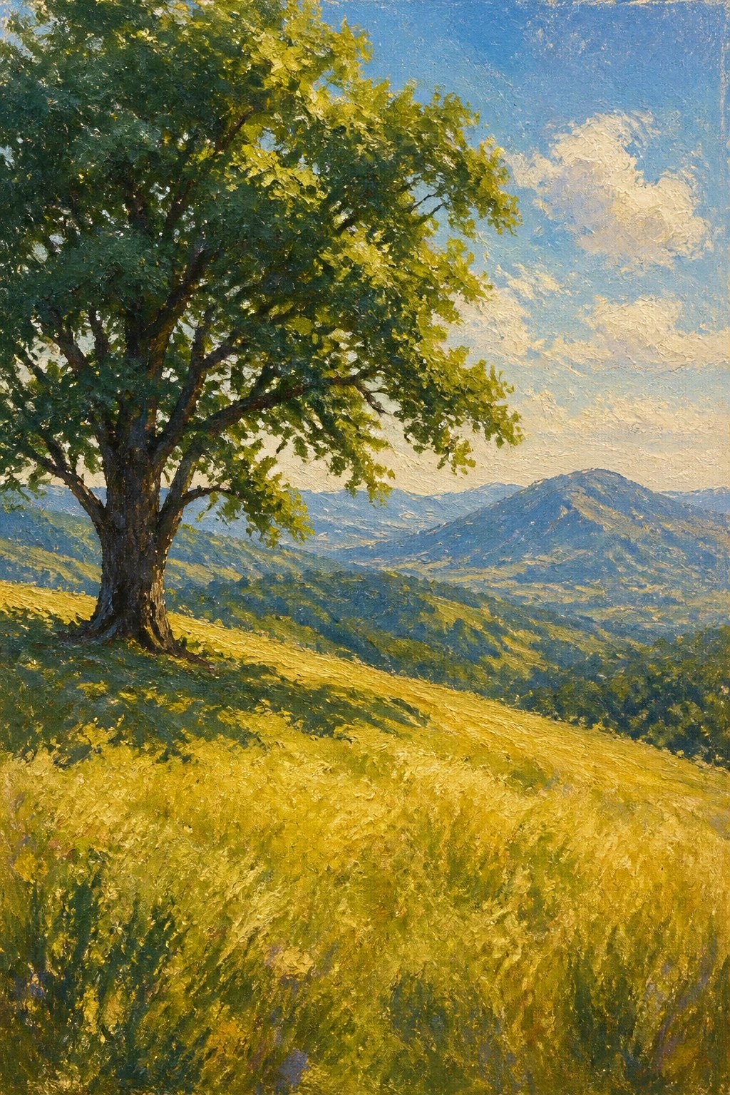 Large tree on sunlit golden hillside with distant blue mountains beyond