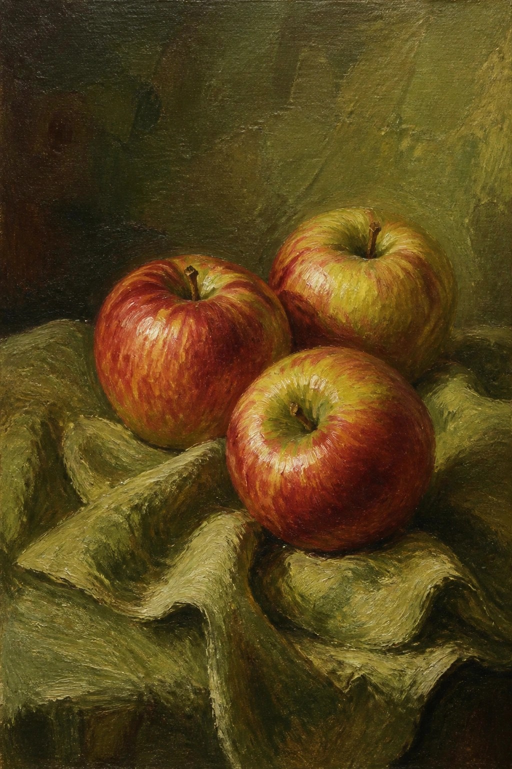 Three red-yellow apples on rumpled green fabric in an oil painting.