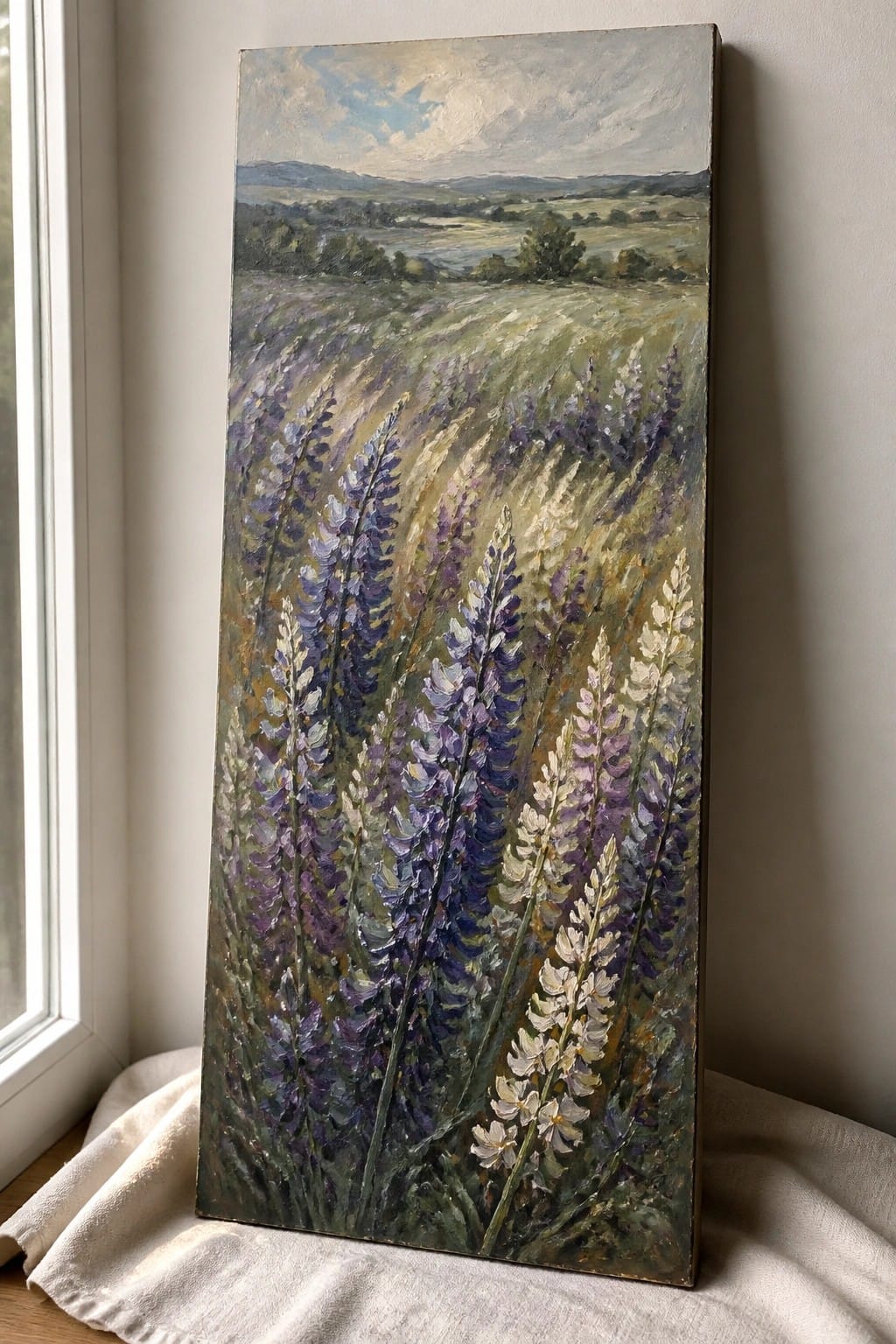 Vertical oil painting of purple and white lupines in a green meadow landscape