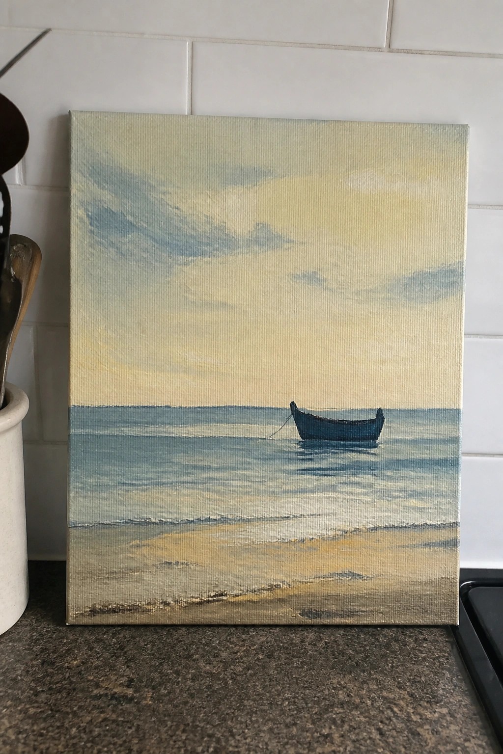 Seascape painting of lone boat on calm blue waters above sandy beach under soft sky