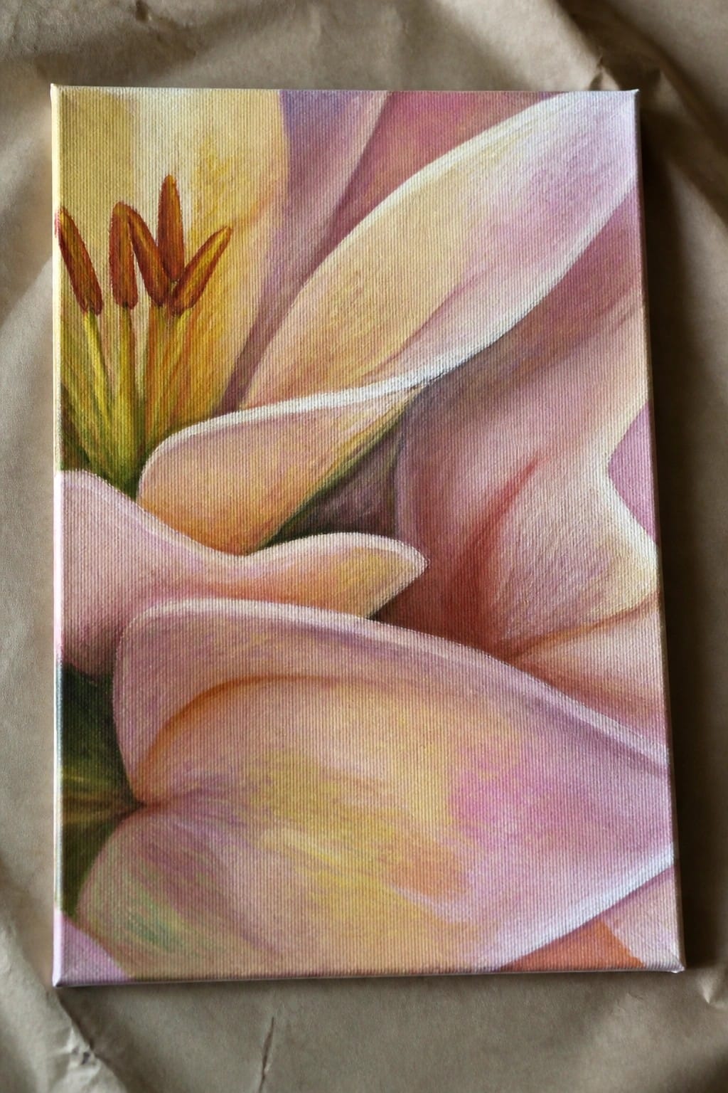 Close-up canvas painting of pink lily with yellow petals and brown stamens