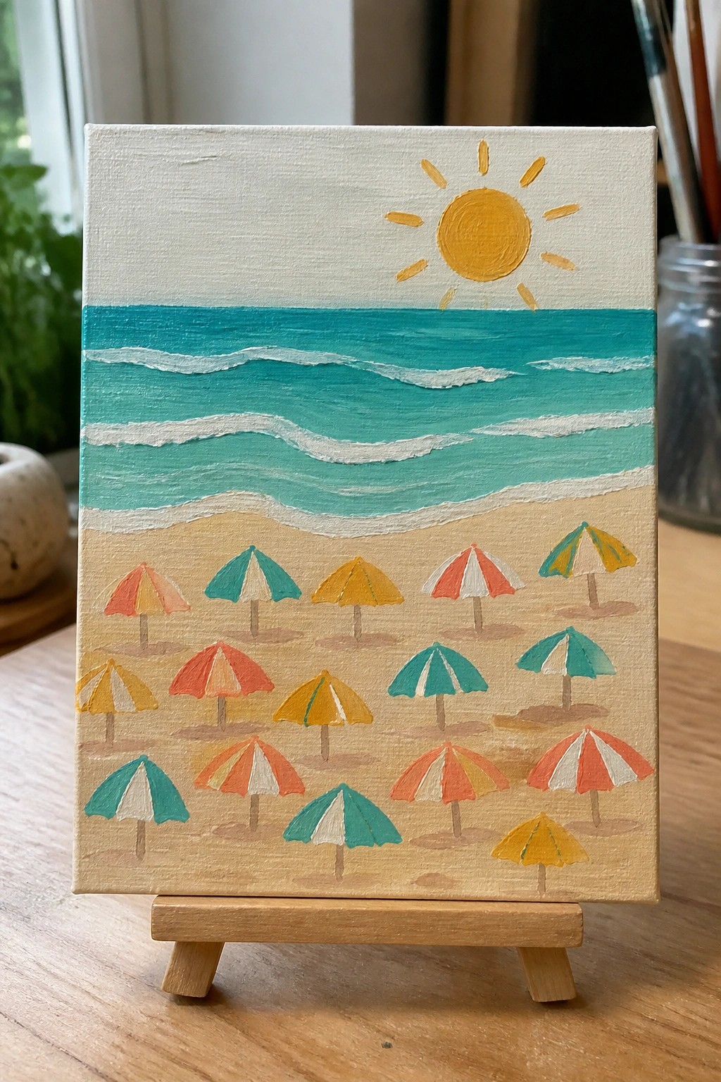 Colorful beach umbrellas on sandy shore beneath yellow sun and turquoise ocean waves on easel