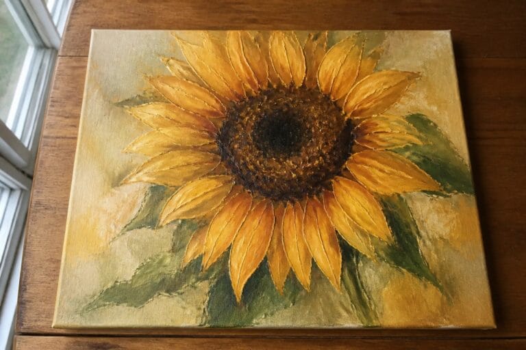 Impasto oil painting of vibrant yellow sunflower with brown center and green leaves on gold background