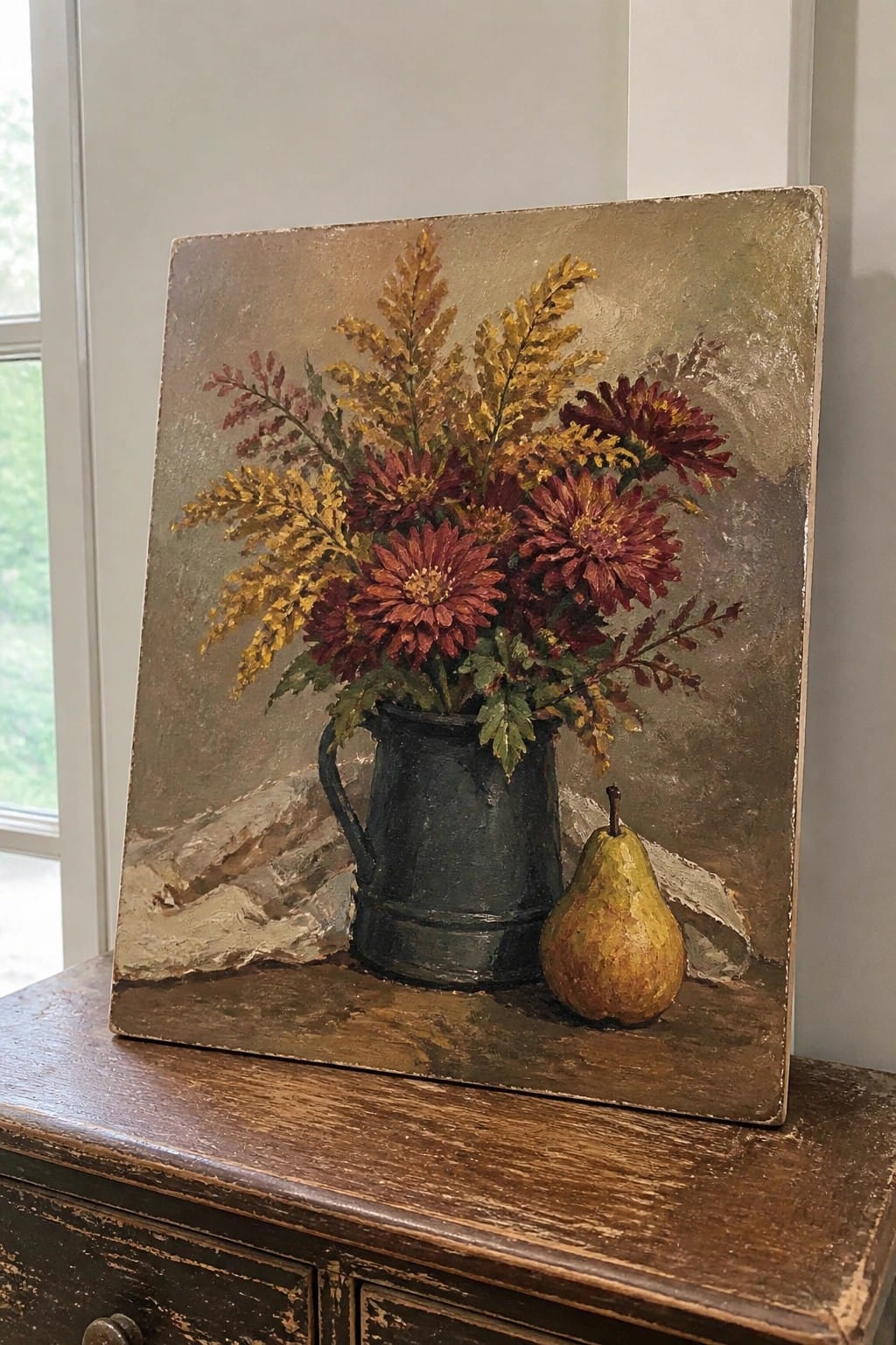 Still life painting of red flowers in dark pitcher beside a ripe pear.