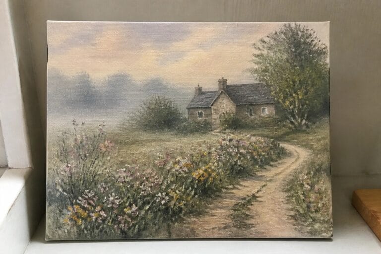 19 Dreamy Cottage Landscape Oil Painting Ideas for Peaceful Scenes Stone cottage beside winding dirt path amid wildflowers, trees, and misty countryside.