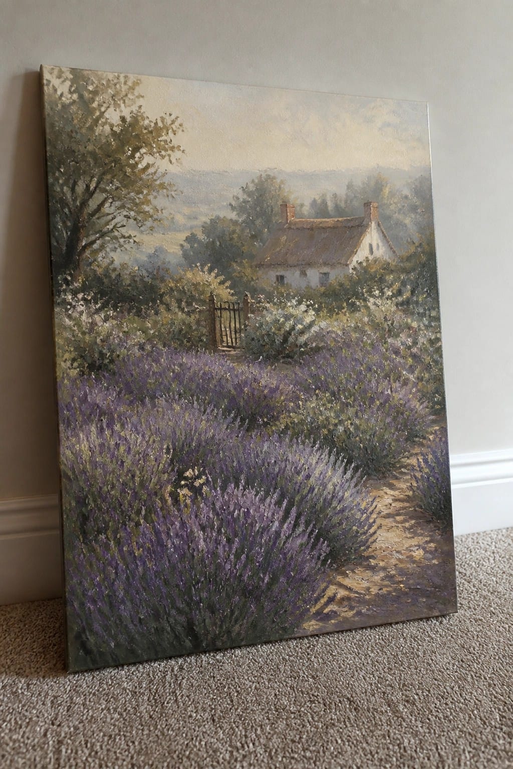 Oil painting of white cottage amid purple lavender fields, winding path, trees, and misty hills.