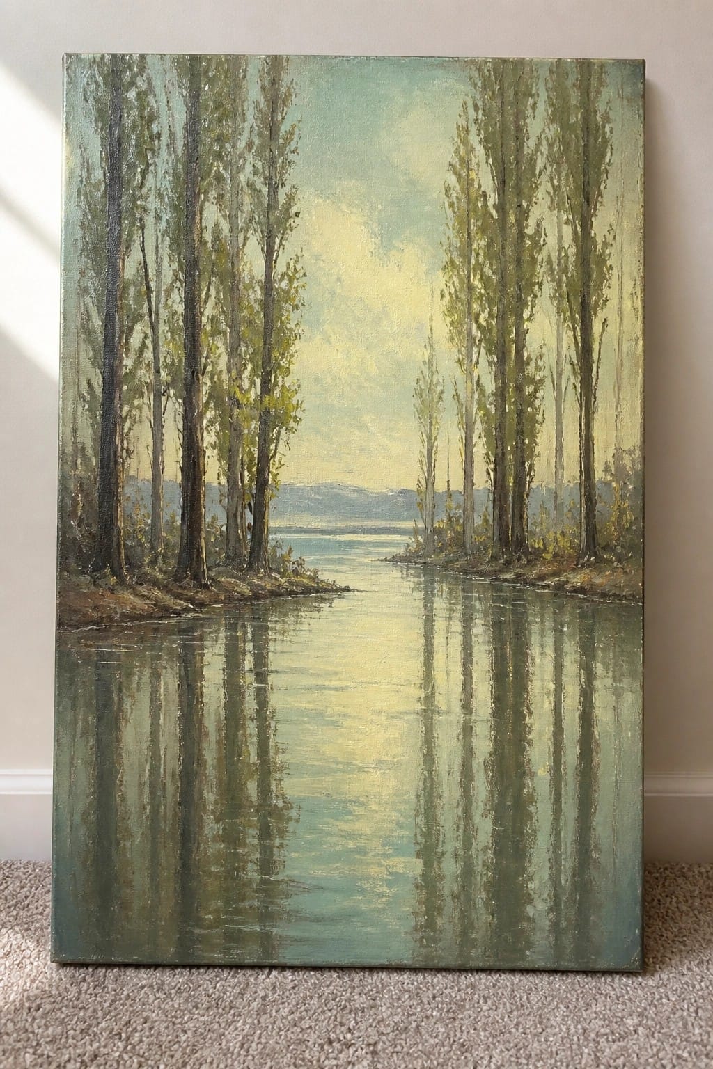 Oil painting of tall trees lining a calm reflective river with hazy mountains beyond.