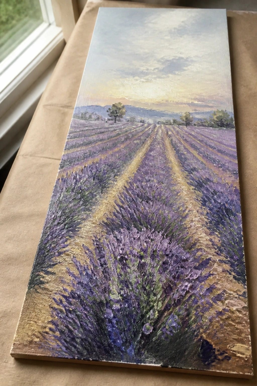 Impressionistic painting of purple lavender rows at sunset with golden paths and hills.