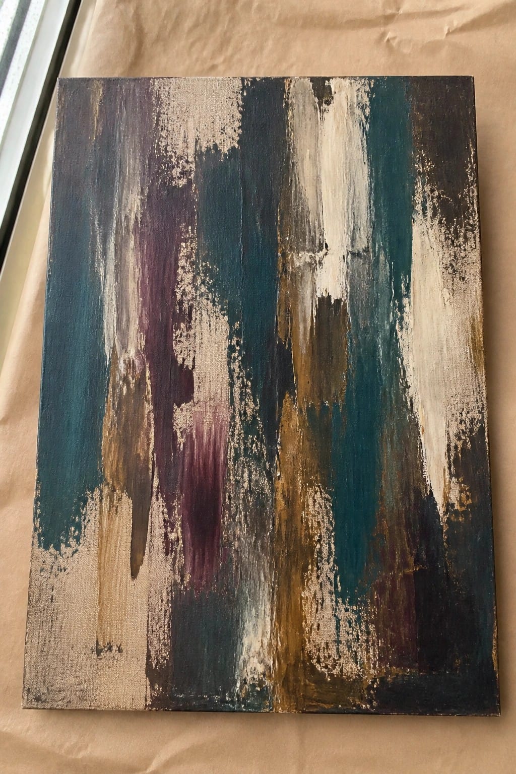 Abstract painting with vertical teal, purple, white and brown brushstrokes on canvas