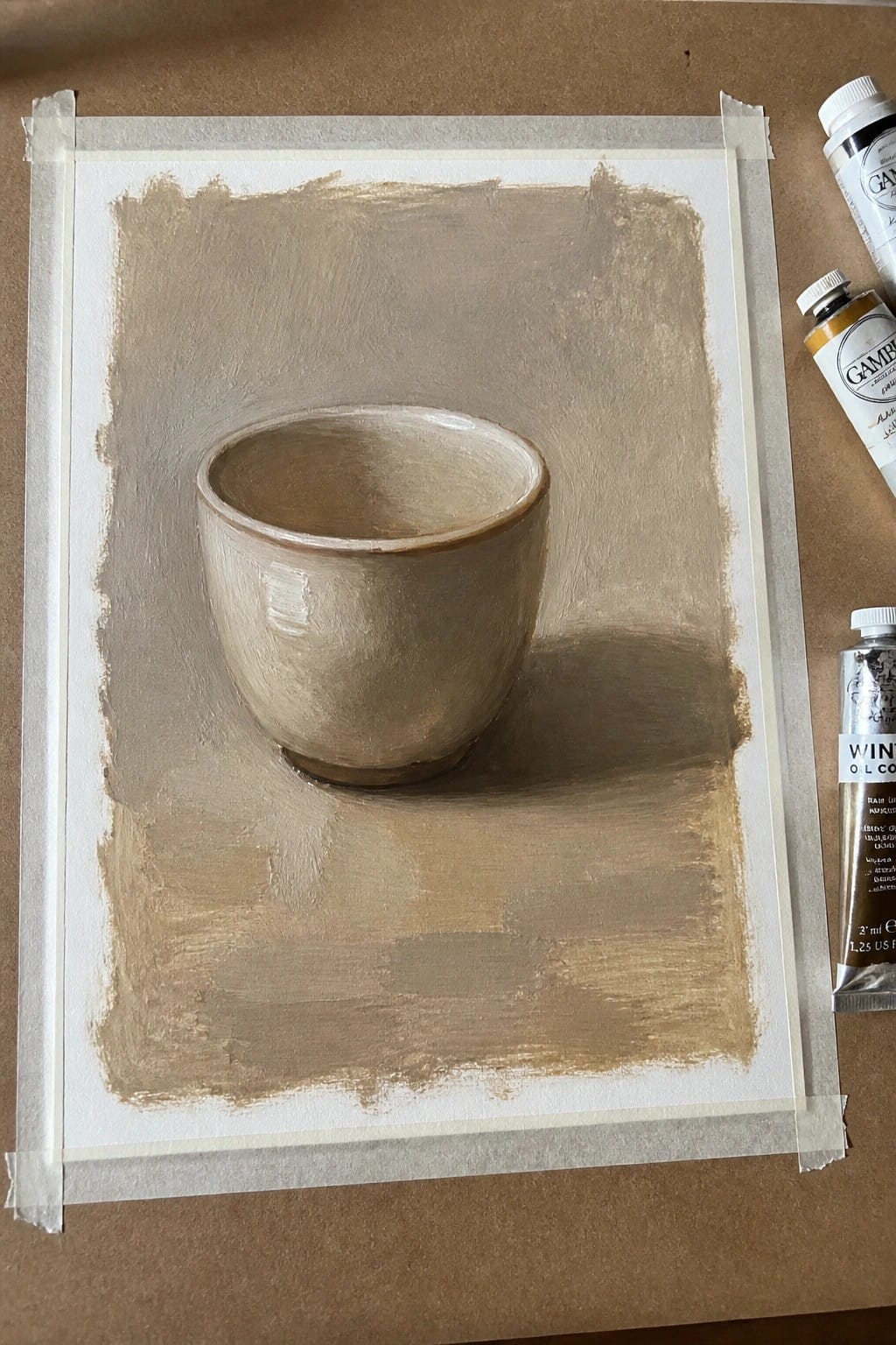 Oil painting of beige ceramic bowl beside three paint tubes on brown surface