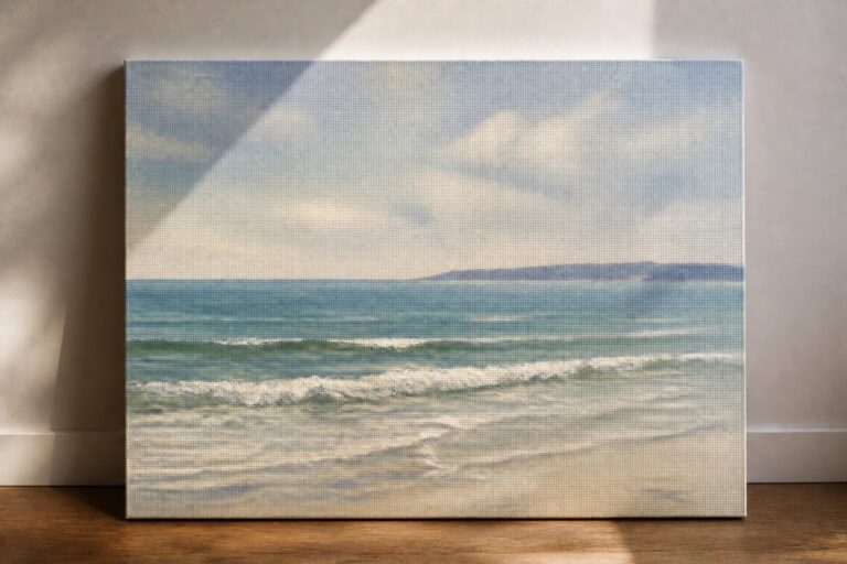 Seascape painting of ocean waves on sandy beach leaning against wall on wood floor