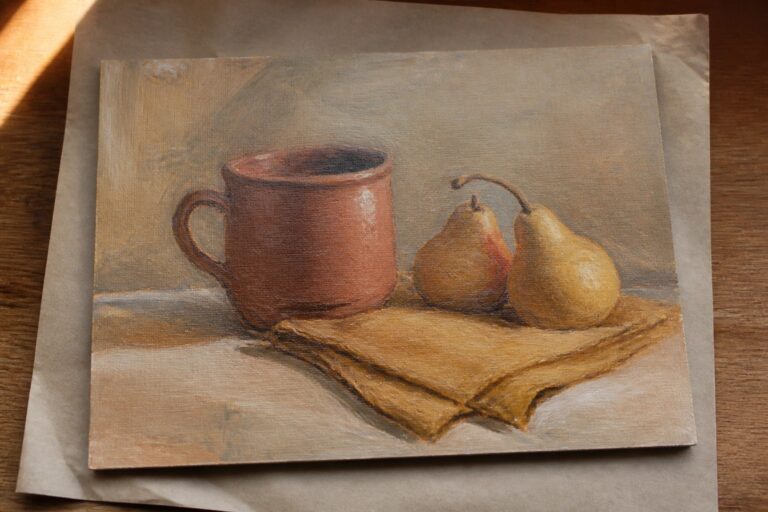Realistic still life painting of two pears beside a brown mug on a book.