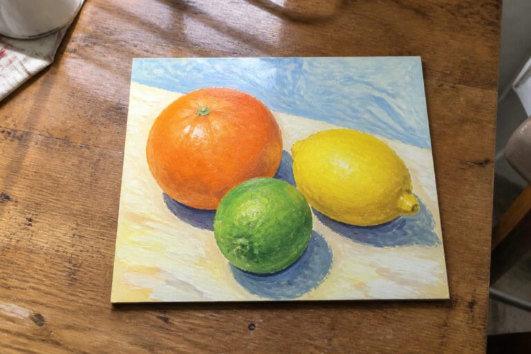 20 Creative Fruit Still Life Painting Setups for Bright Seasonal Artwork Painting of orange, lemon, and lime on white surface under blue sky