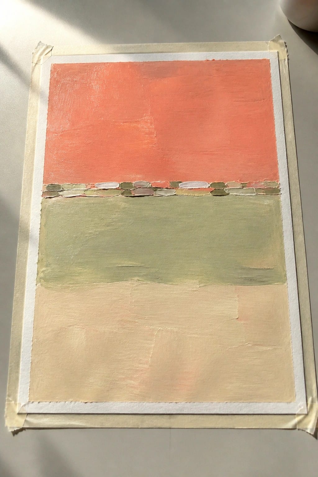 Abstract painting with coral top, mosaic pebble band, sage green and beige sections.