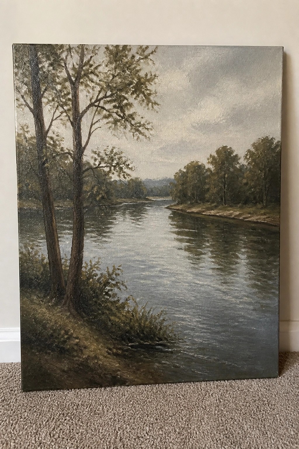 Oil painting of a calm river winding through trees under a cloudy sky