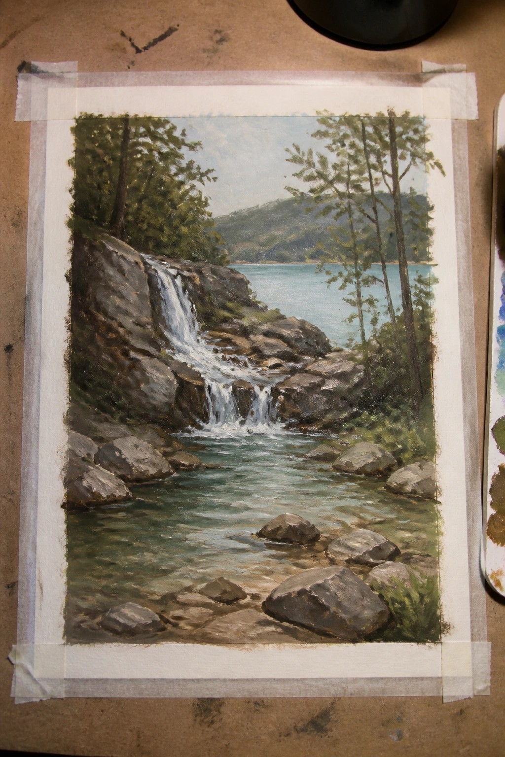 Painting of cascading waterfall over rocks into a rocky stream with trees and hills.