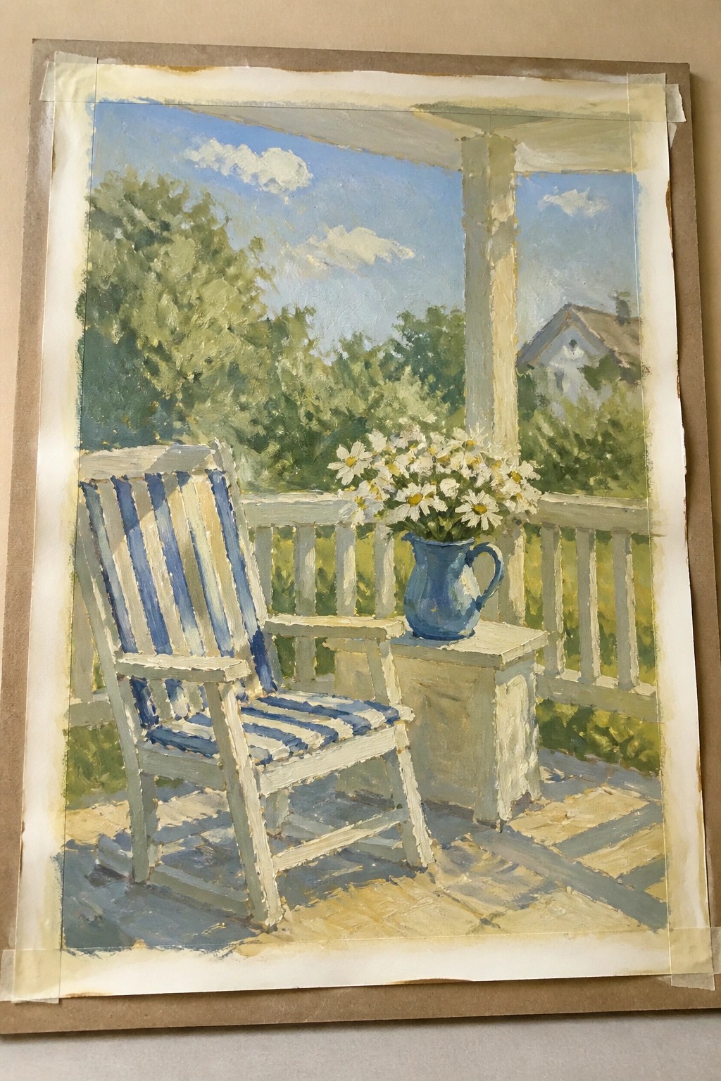 Porch scene with blue-striped rocking chair and blue pitcher of white daisies