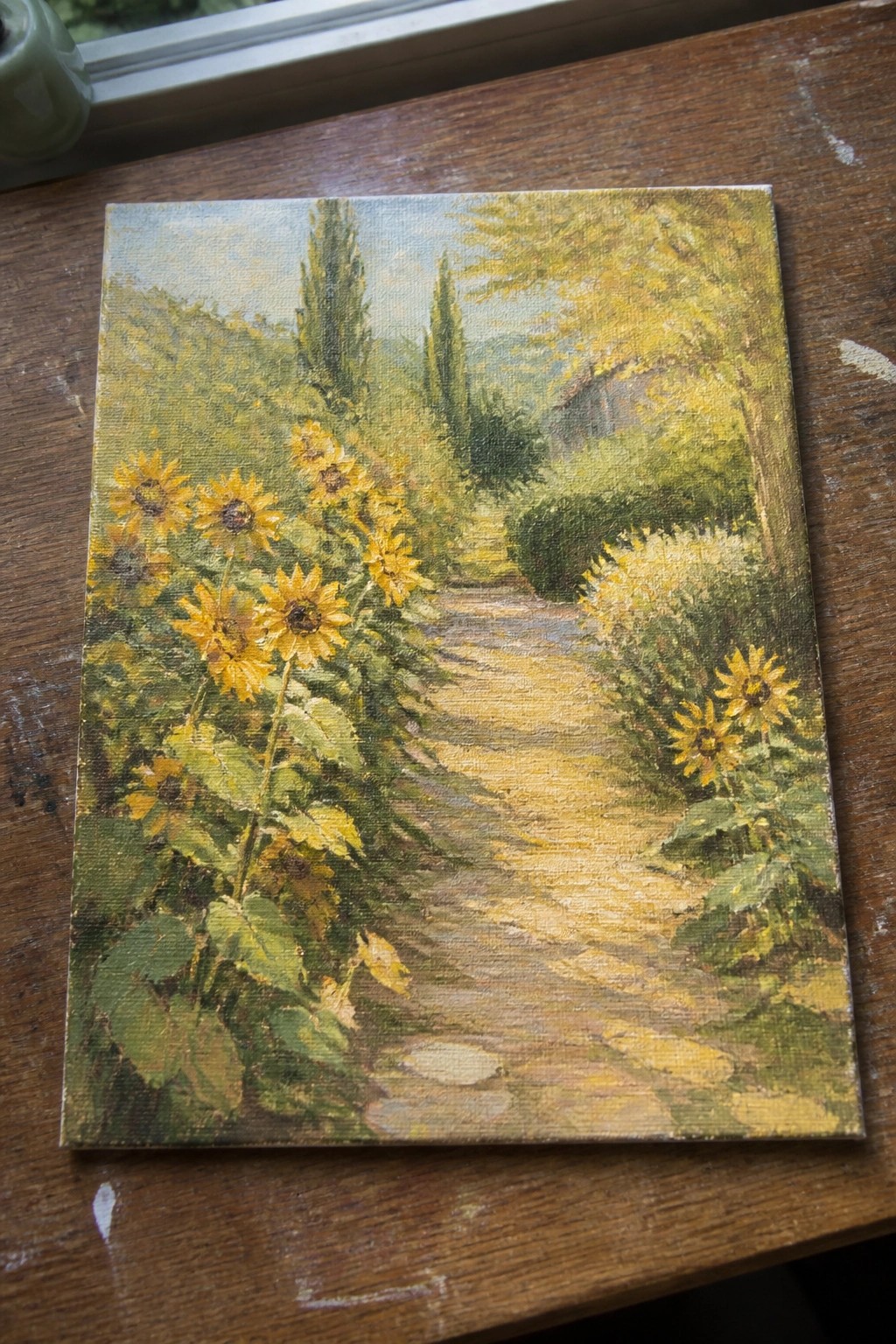 Vibrant oil painting of sunflowers lining a winding garden path with trees