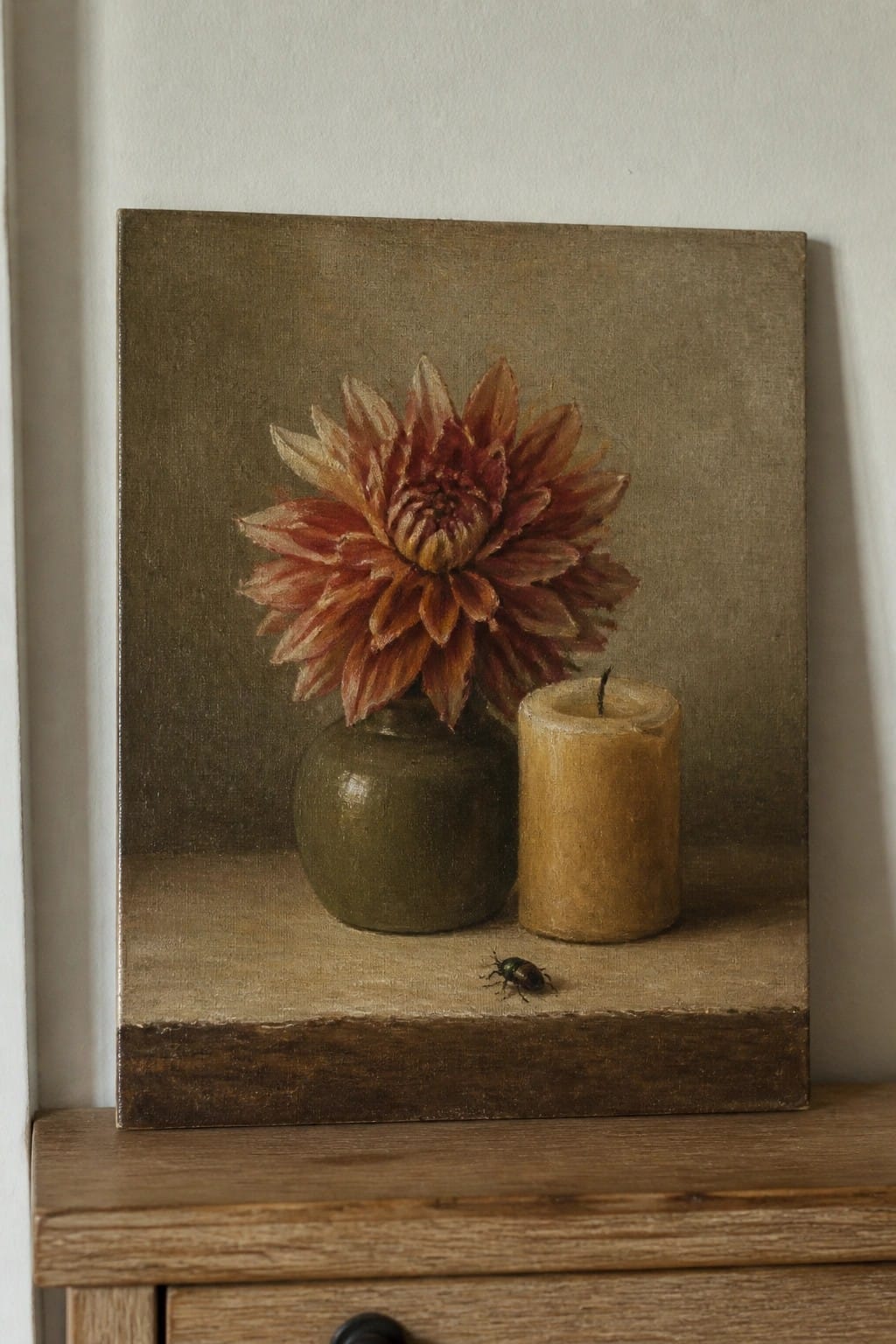 Still life painting of red dahlia in green vase beside candle and small beetle