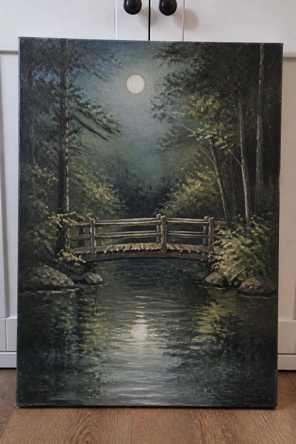 An oil painting of a wooden bridge over a dark river in a forest at night with a full moon and reflections in the water.
