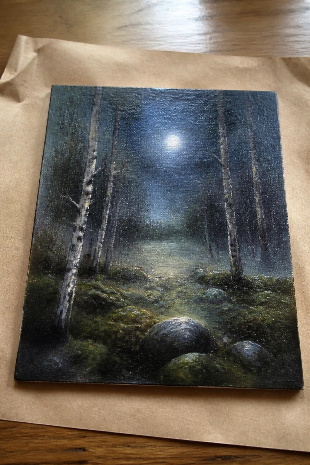 Moonlit forest oil painting with birch trees, mossy rocks, and glowing path