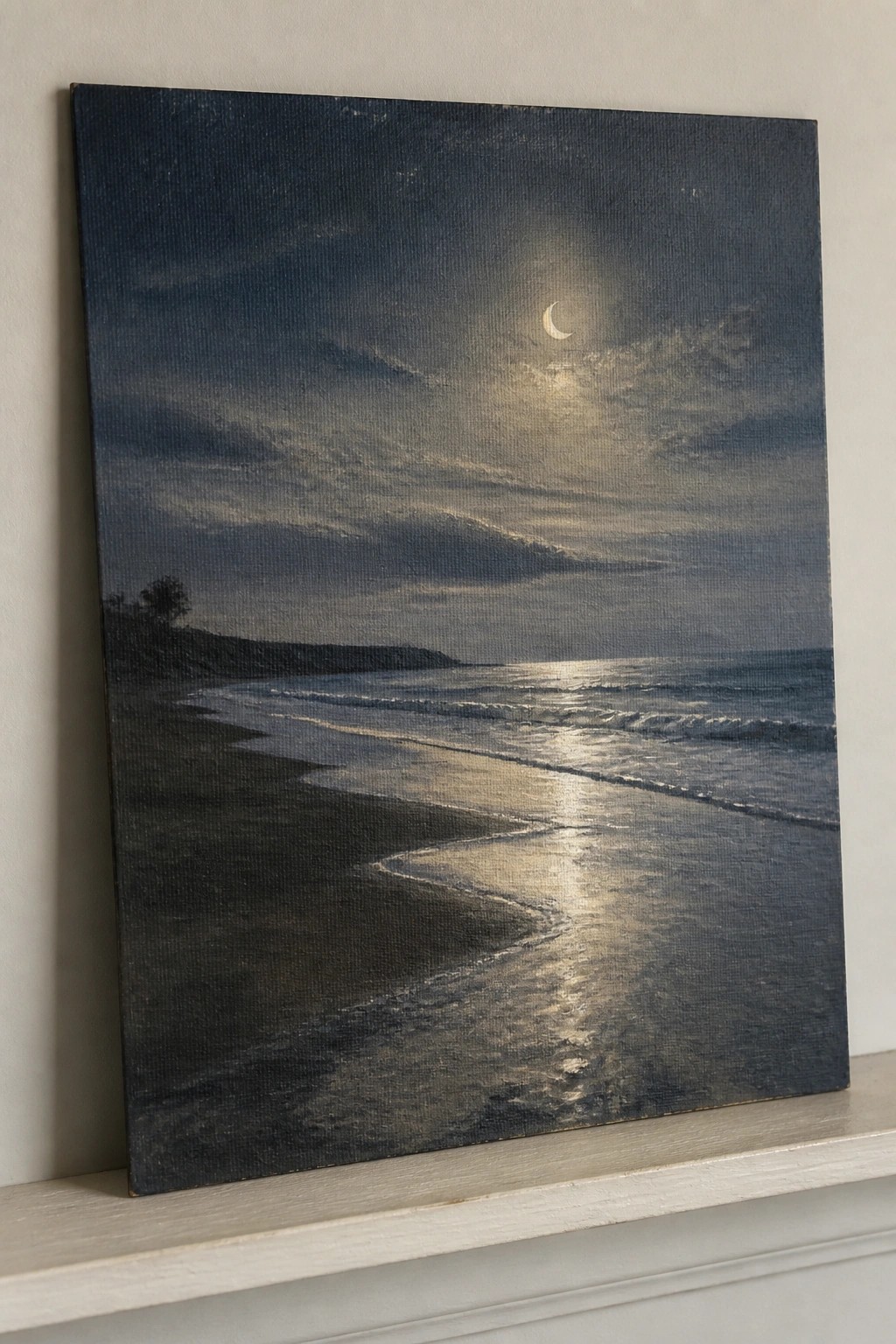 Nocturnal beach painting with crescent moon, cloudy sky, and moonlight on waves
