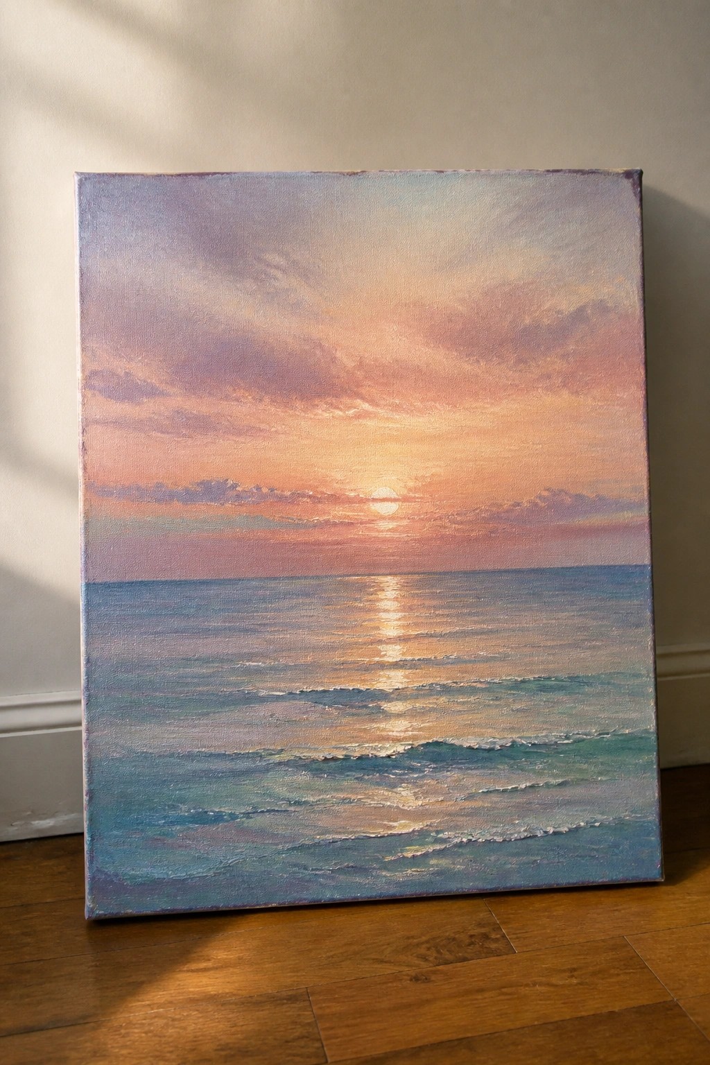 Seascape painting of sunset with pink clouds, sun reflecting on blue ocean waves
