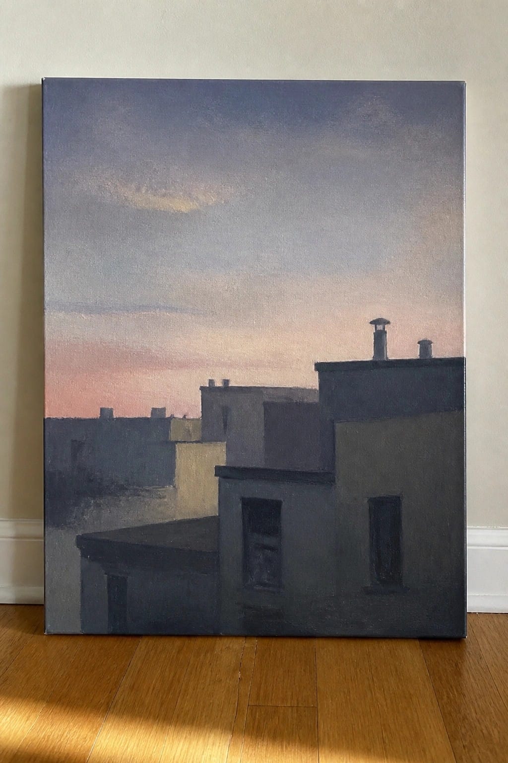 Dark rooftops with chimneys against a pink-blue gradient twilight sky on wooden floor