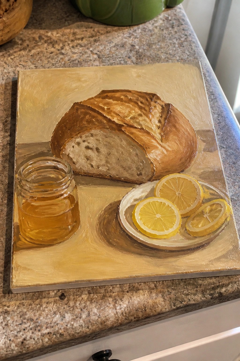 Still-life painting of sliced bread loaf, honey jar, and lemon slices on plate
