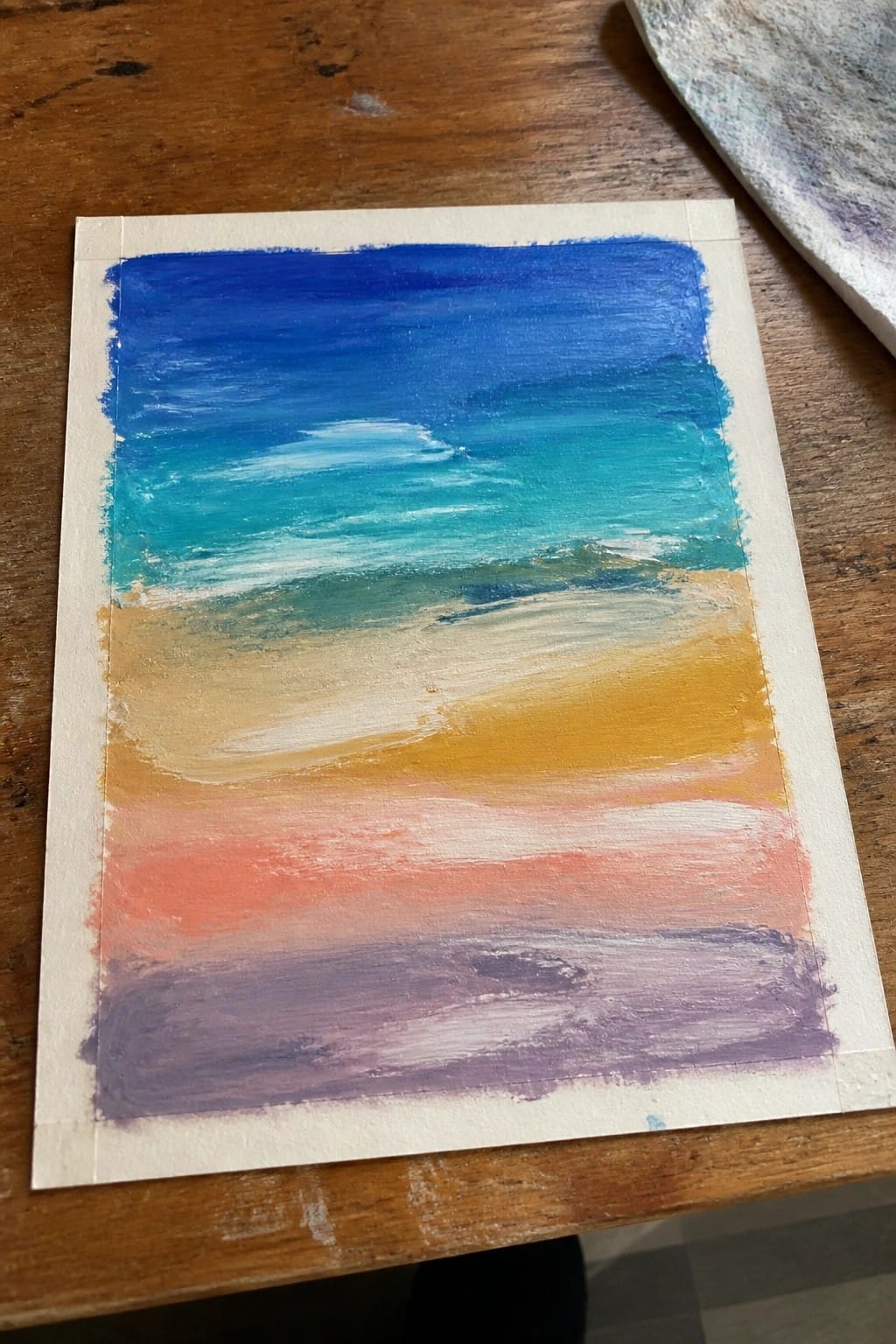Abstract painting of seascape with blue sky, turquoise sea, yellow sand, pink and purple bands