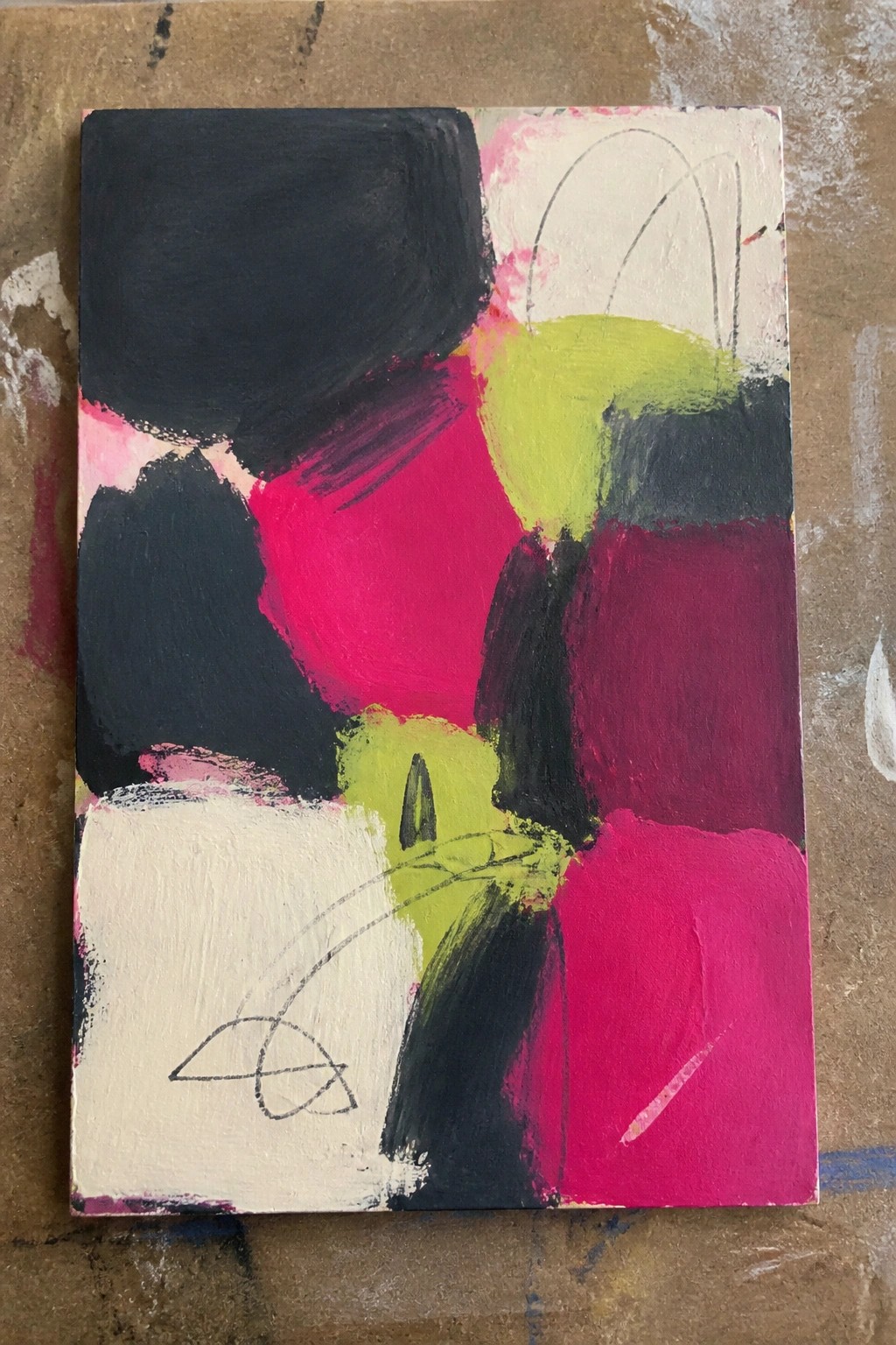 Abstract painting with bold black, pink, magenta, lime green, and white blocks and lines.