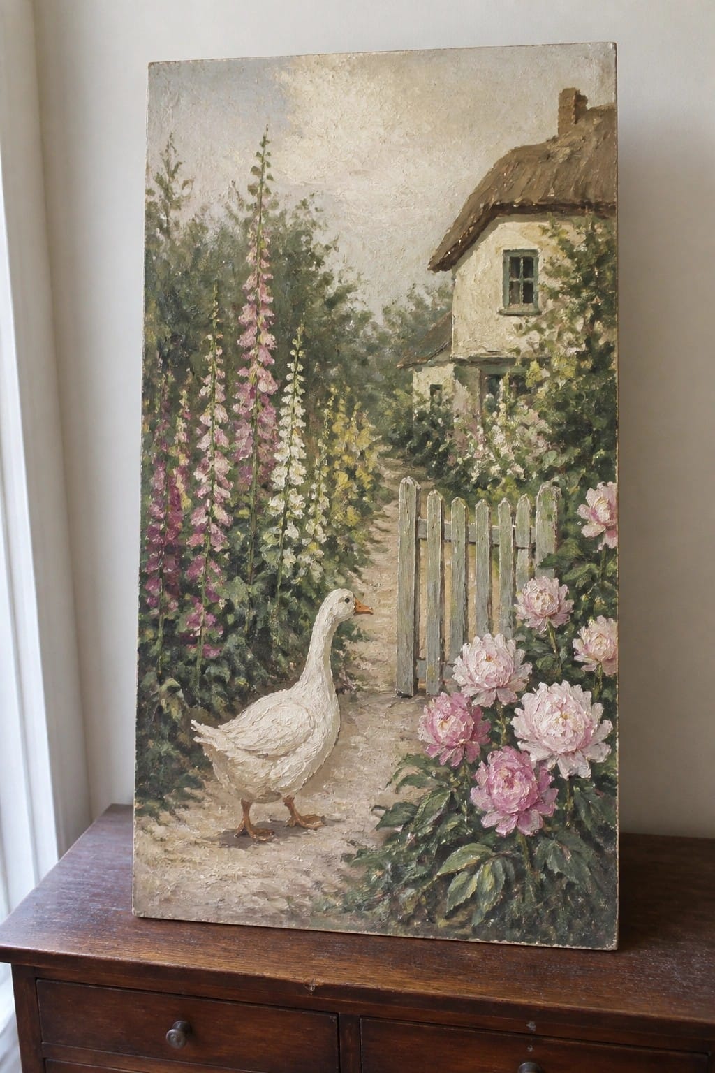 White goose on path amid pink peonies and foxgloves near thatched cottage