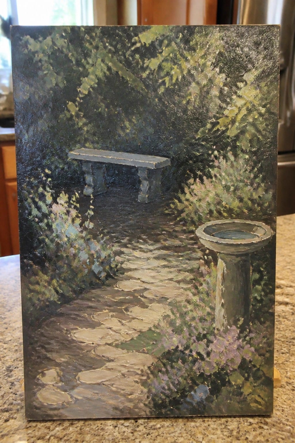 Oil painting of lush garden path with stone bench and birdbath amid foliage