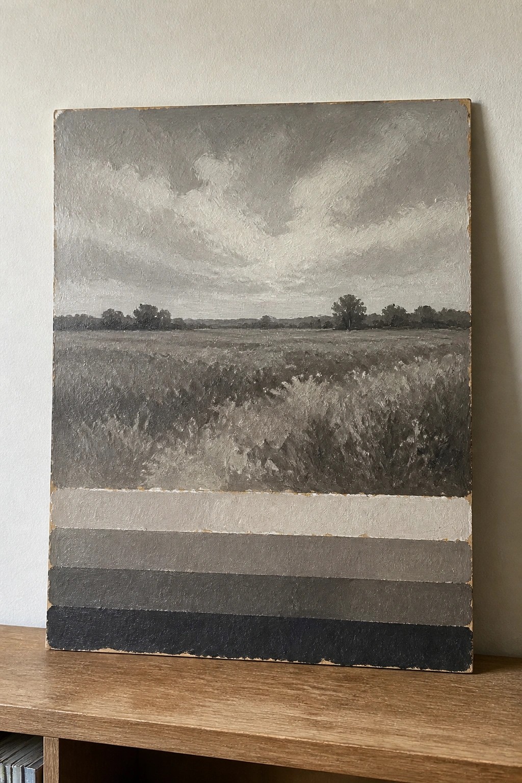 Grayscale landscape painting of open field with cloudy sky and gray stripes below