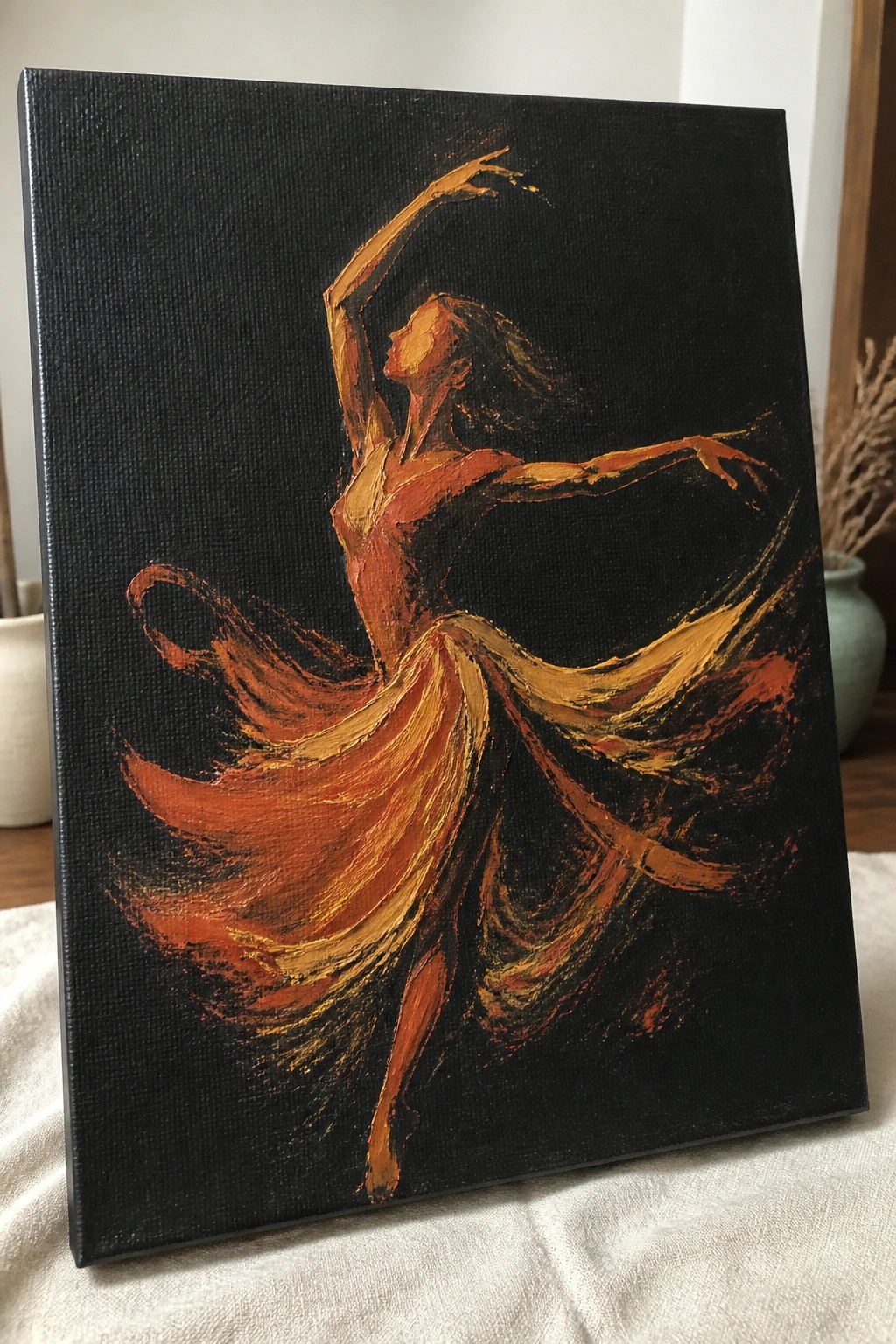 Expressive painting of a dancer in flowing orange dress against black background