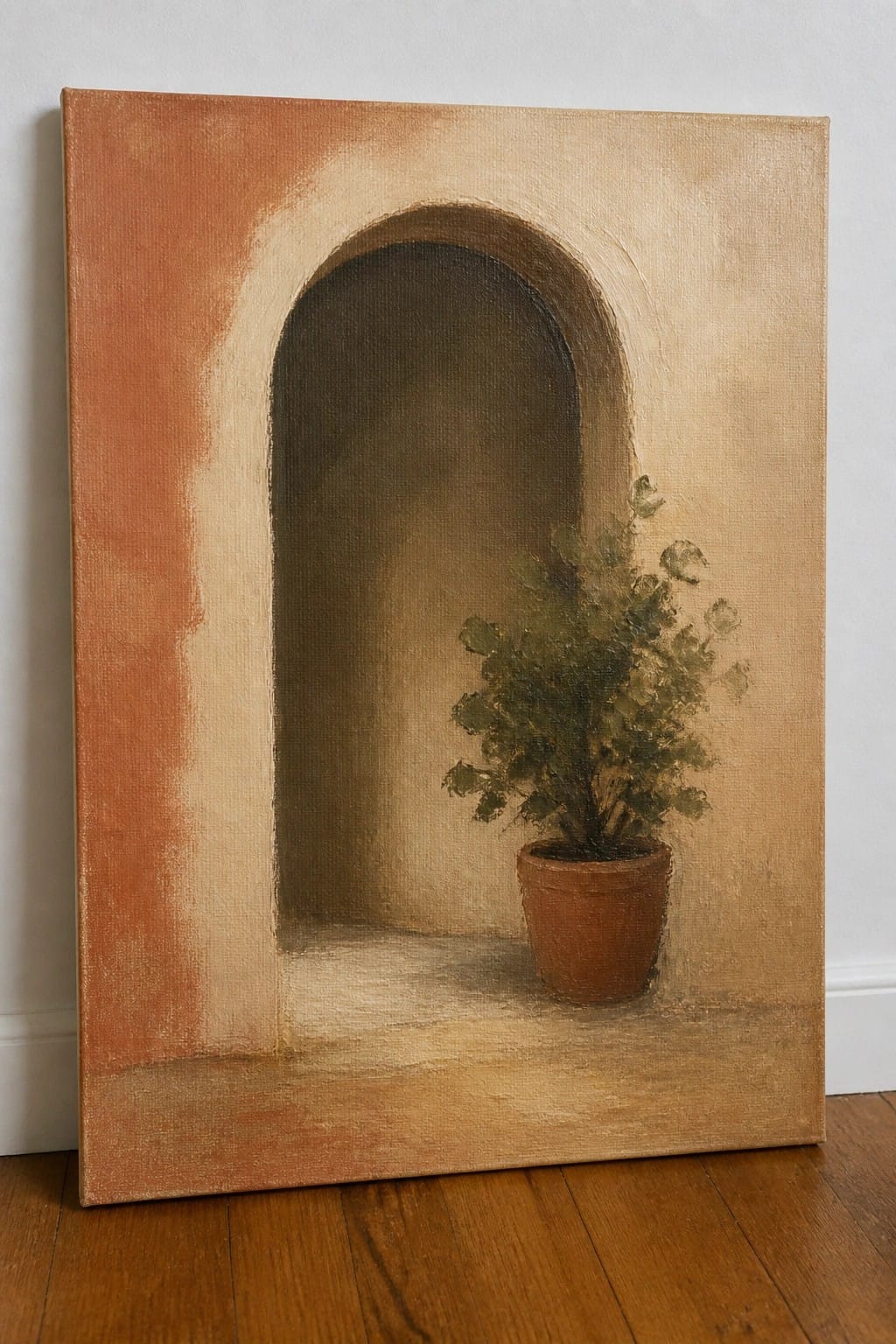 Painting of potted plant in terracotta pot within warm-toned arched alcove on wood floor