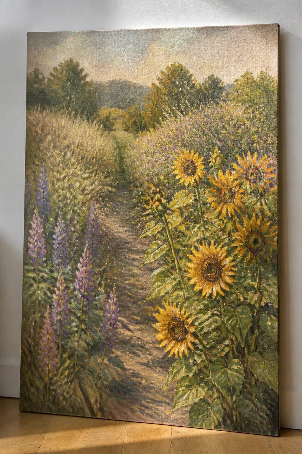 Impressionistic painting of sunflowers beside a dirt path through a wildflower meadow with trees