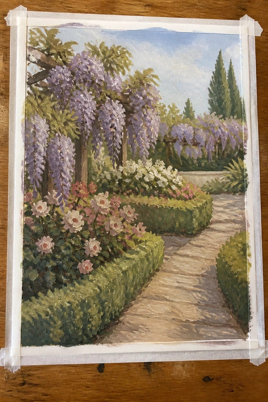 Garden painting with stone path, blooming roses, purple wisteria arches, and green hedges