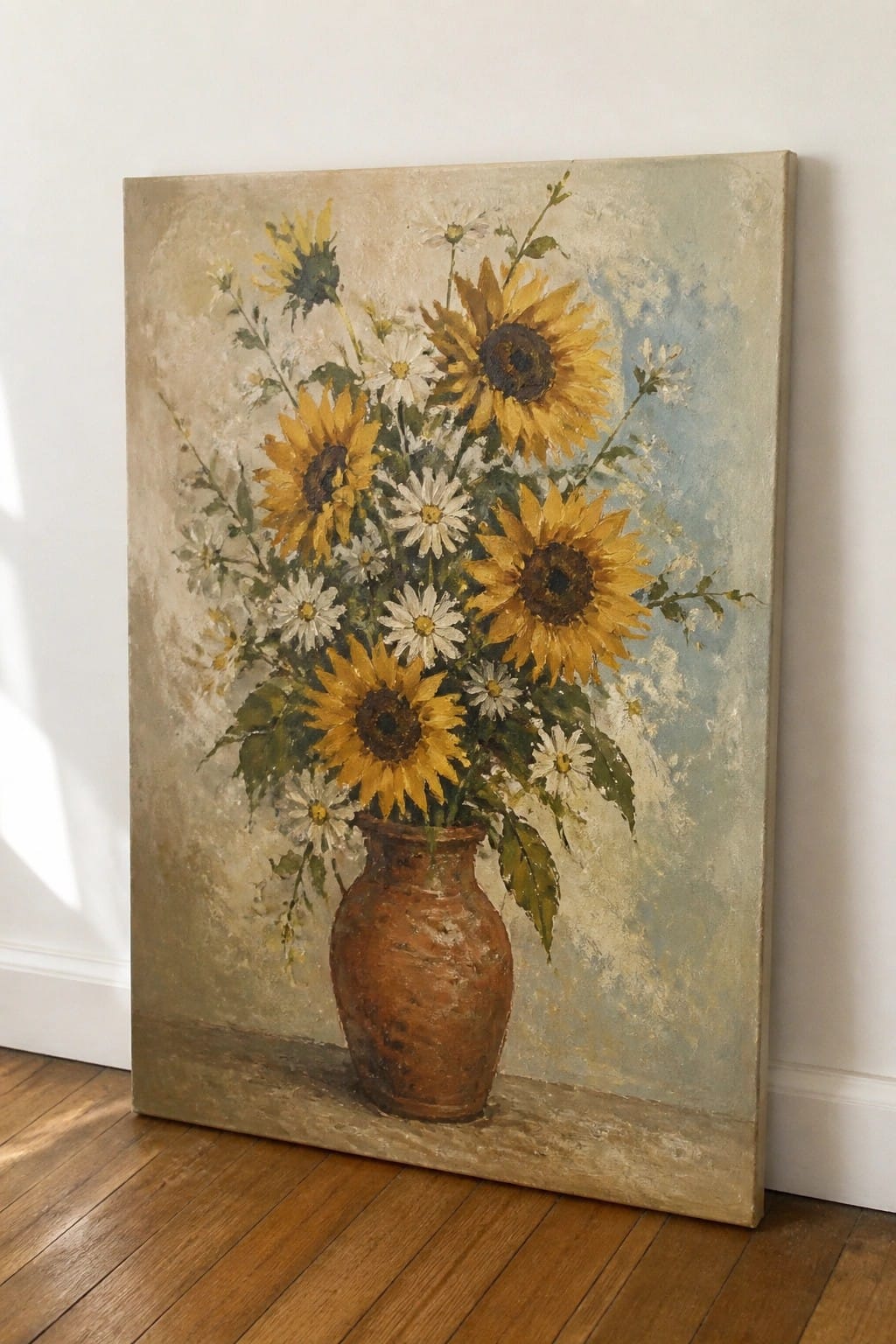 Oil painting of sunflowers and daisies in terracotta vase on wooden floor