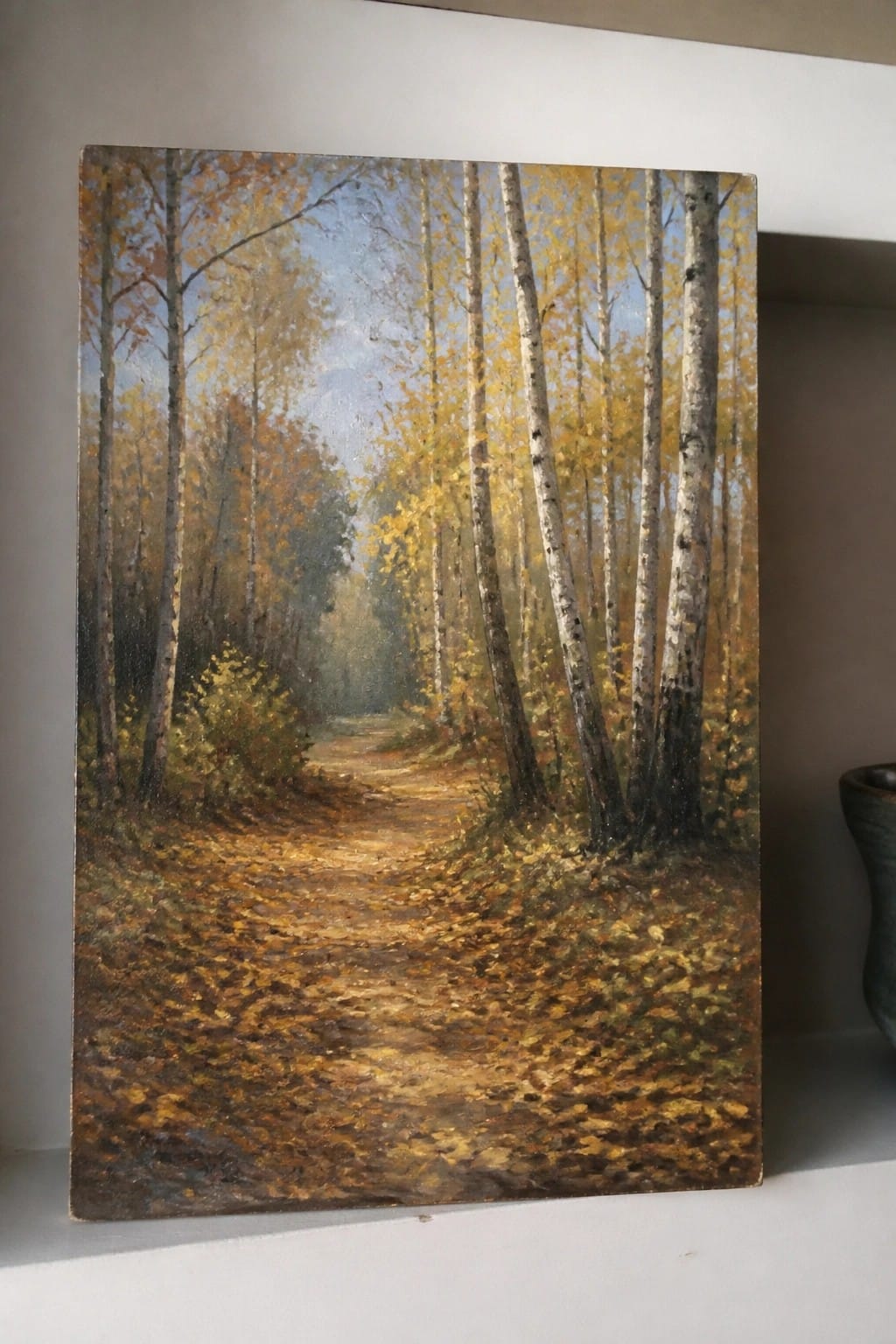 Realistic oil painting of a leaf-strewn path winding through golden autumn birch trees