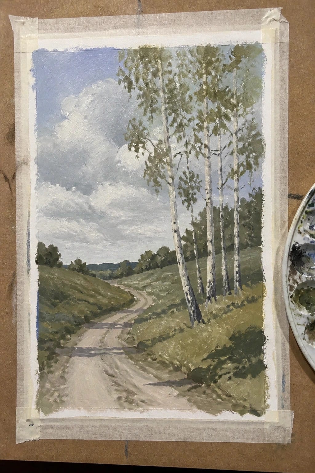 Oil painting of birch trees along winding dirt road through green hills under cloudy sky