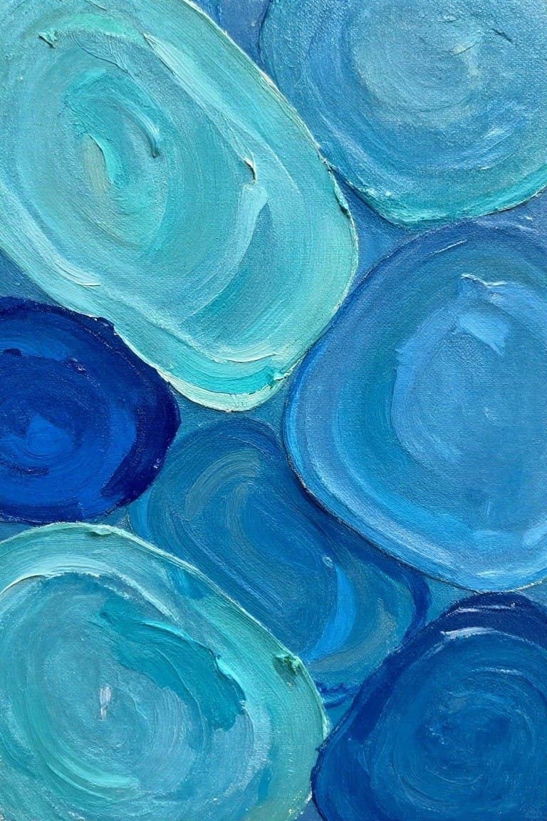 Abstract painting of overlapping swirling circles in various shades of blue and turquoise