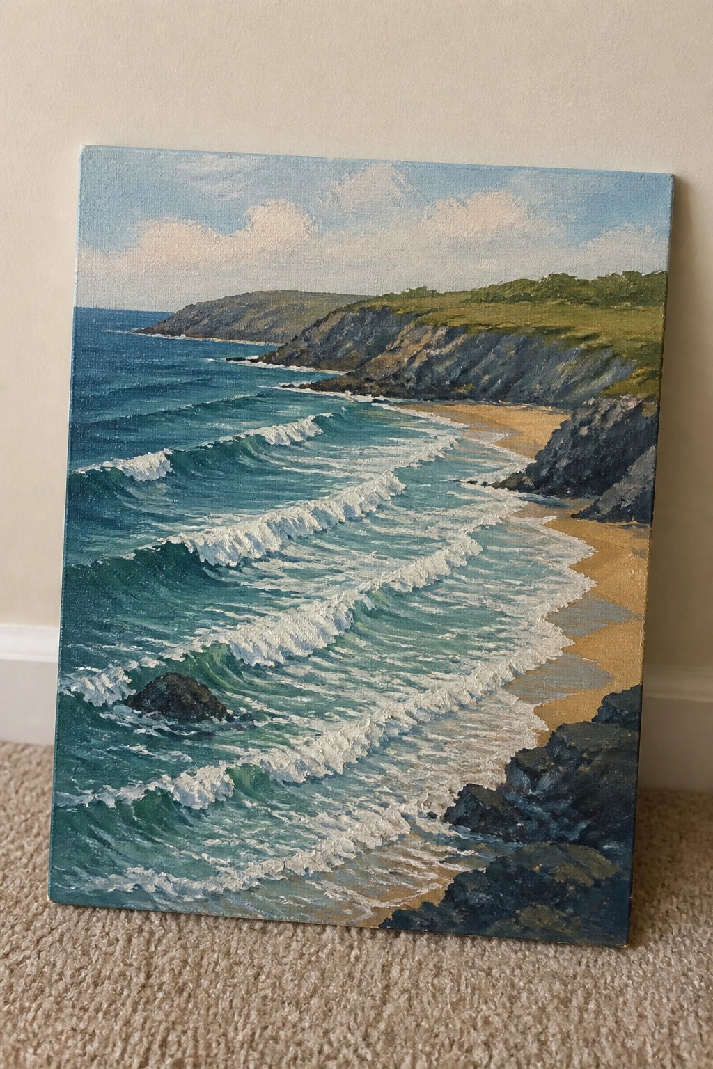 Oil painting of blue-green waves with white foam approaching a sandy beach and cliffs