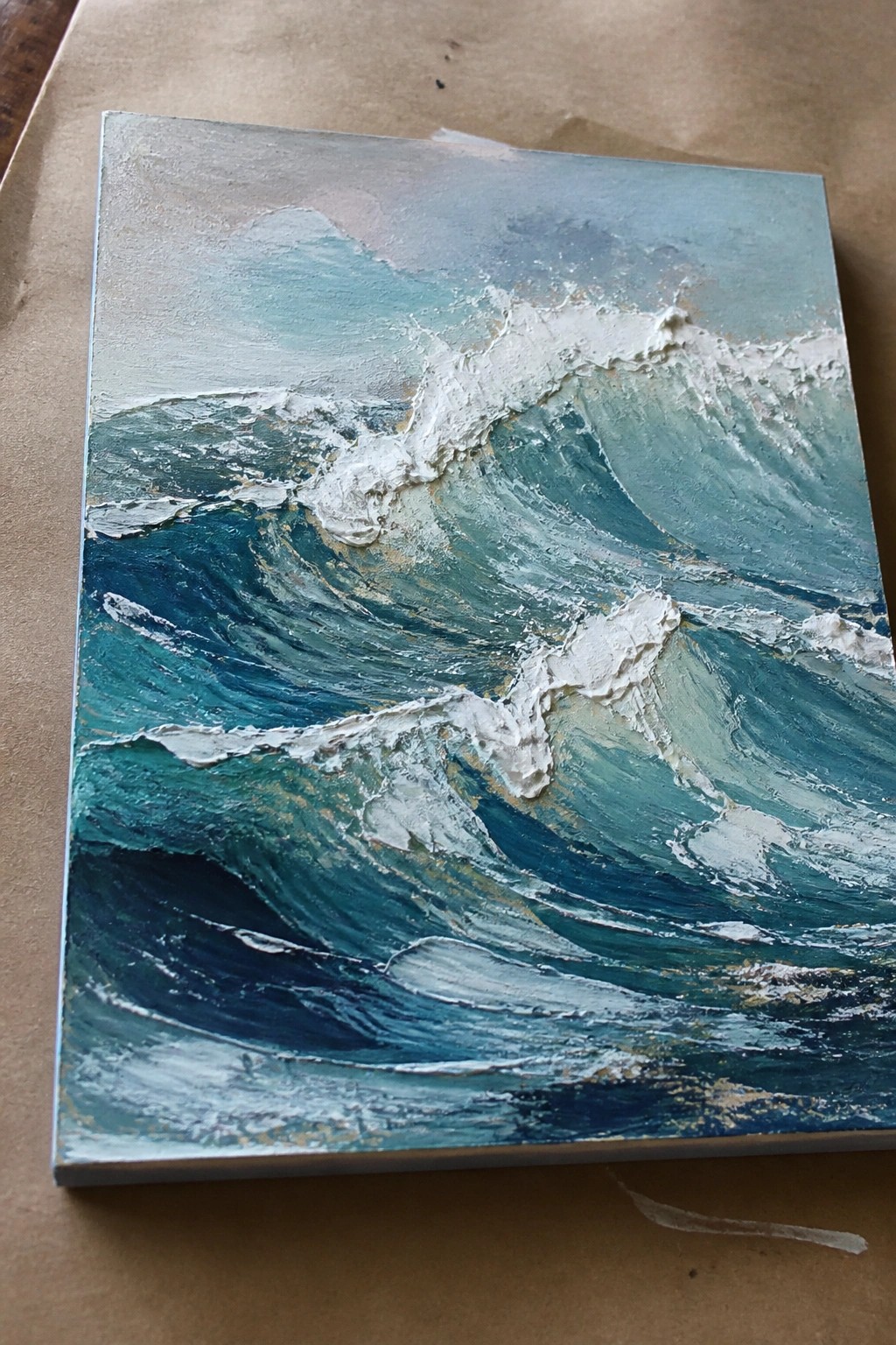Textured painting of rolling teal ocean waves with thick white foam crests