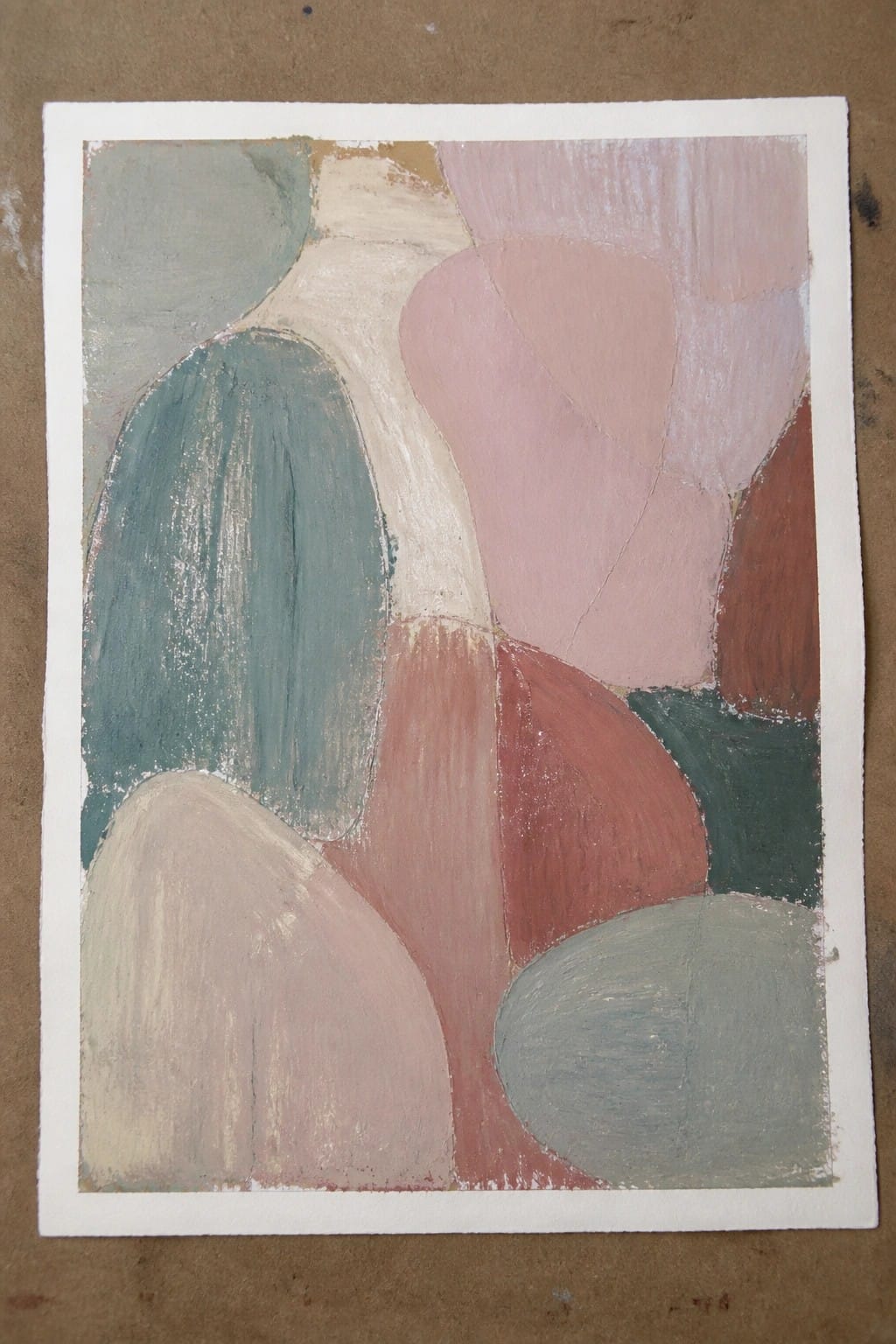 Abstract painting of soft overlapping shapes in muted teal, pink, brown, and beige.