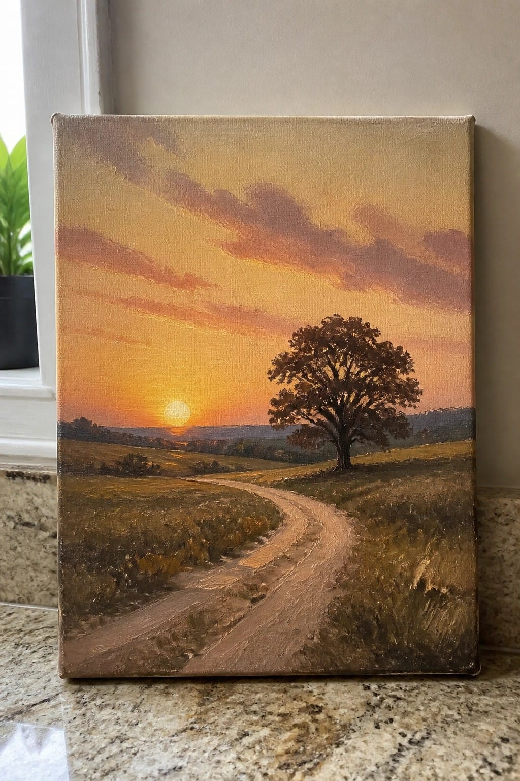 Oil painting of winding dirt road curving to lone tree under orange sunset skies