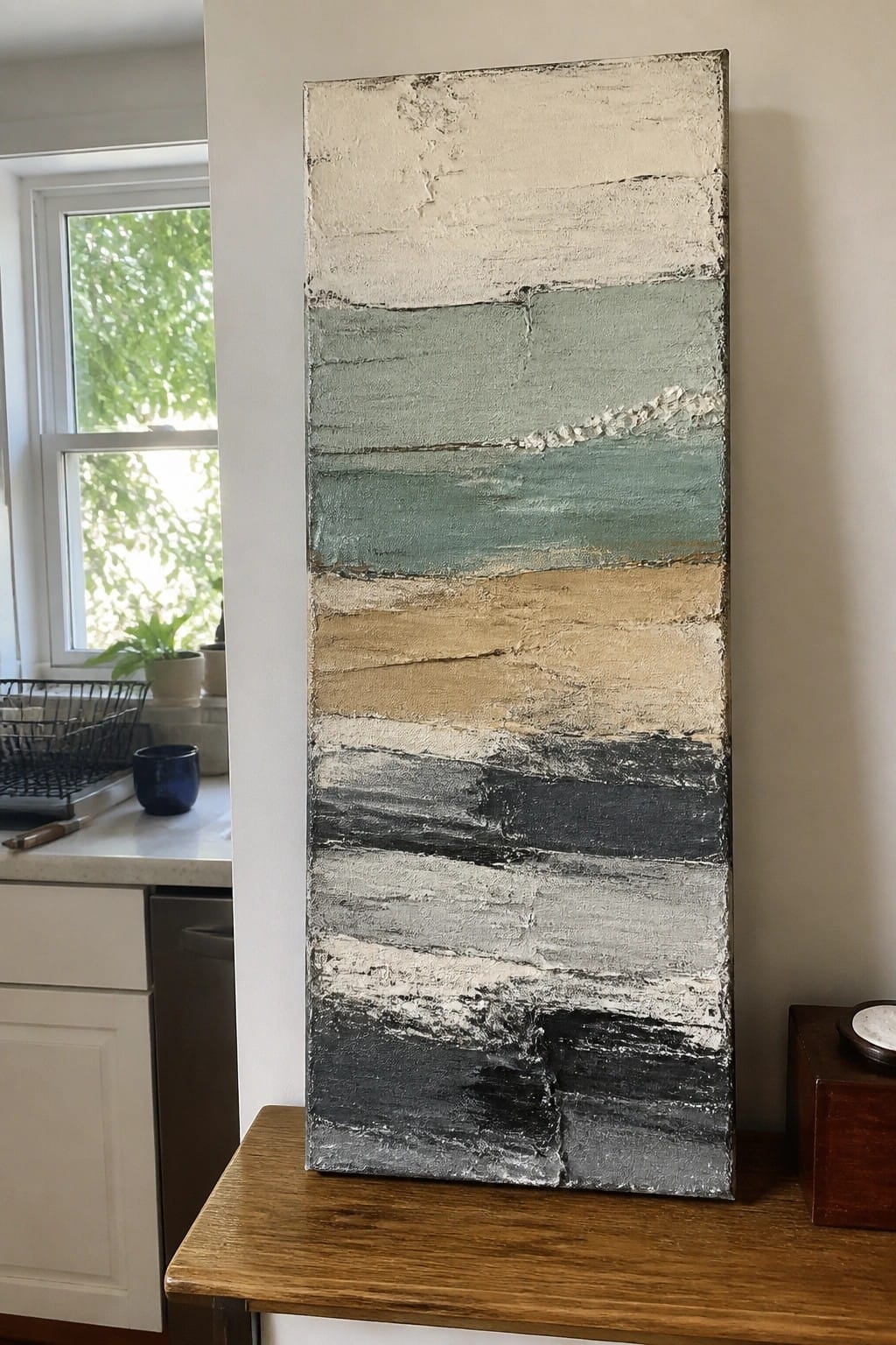Abstract painting with textured horizontal layers of white, teal, beige, and gray on canvas.