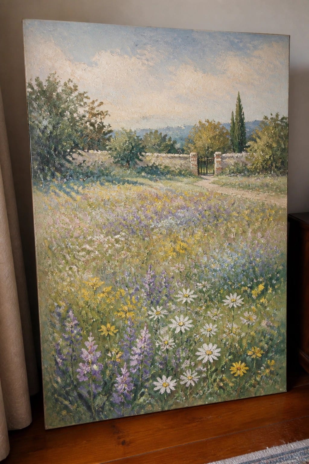 Vibrant impressionist painting of wildflower meadow with stone wall, gate and trees