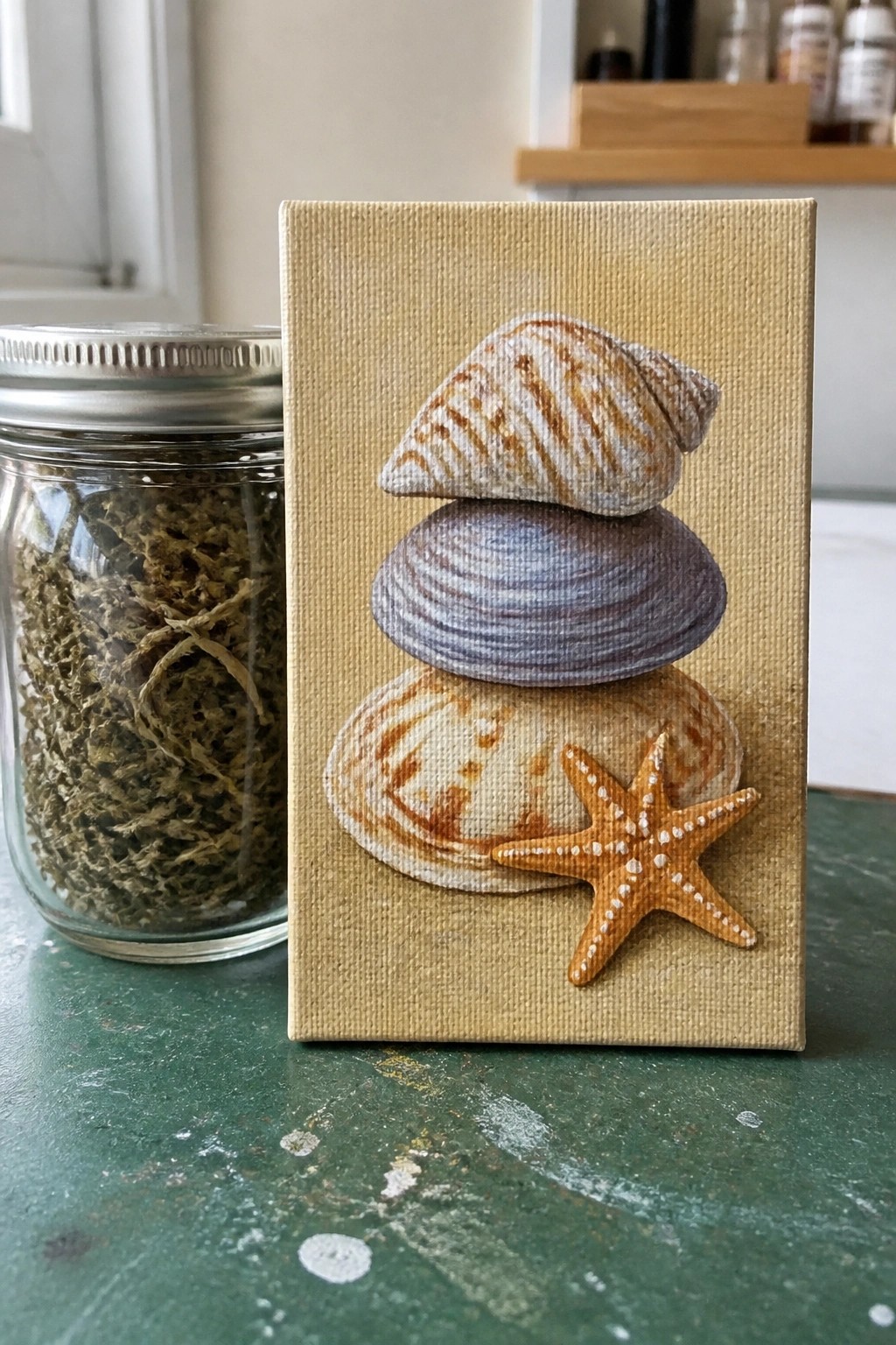 Stacked seashells and orange starfish on beige canvas beside glass herb jar