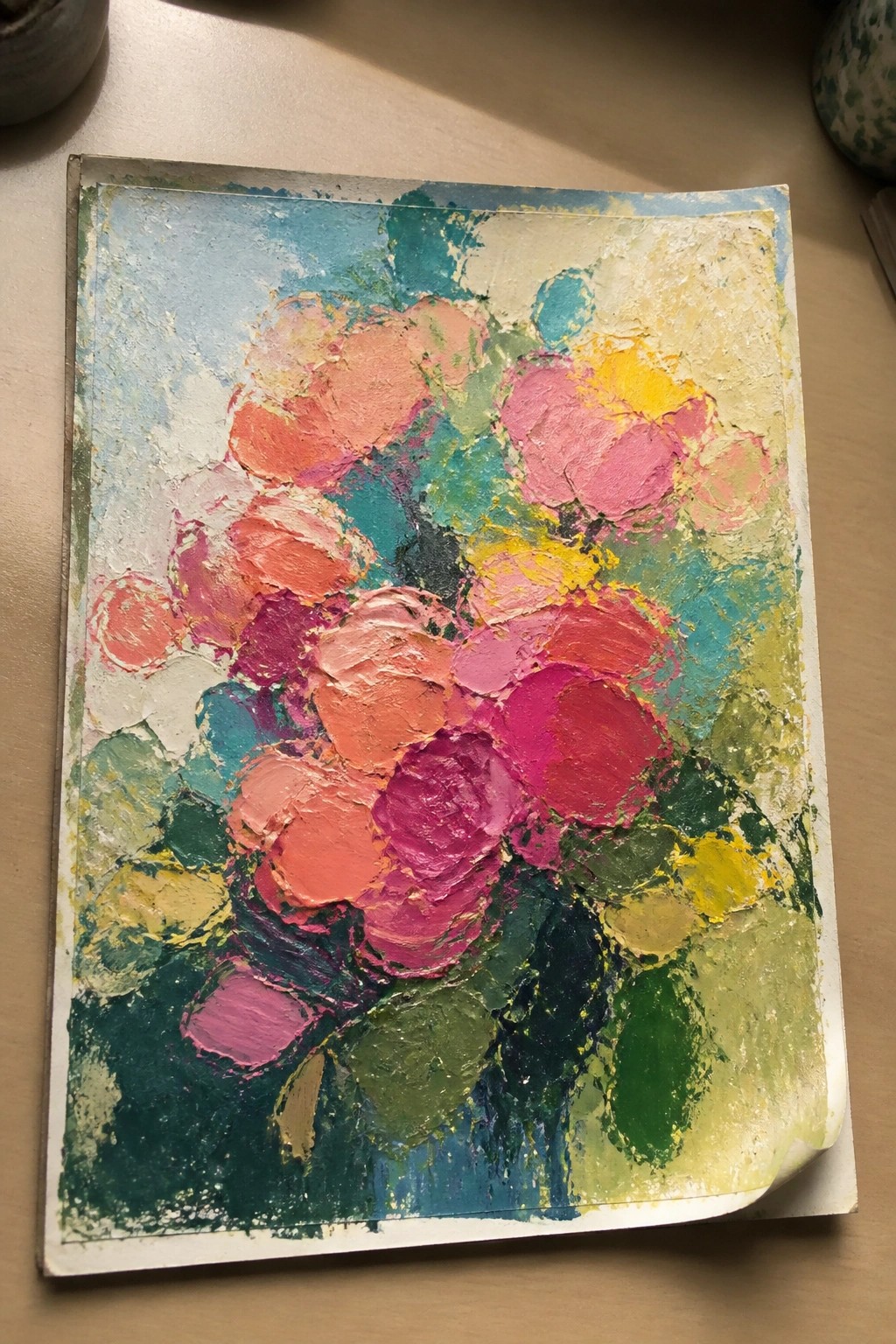 Vibrant impasto painting of pink, orange, and magenta flowers with green leaves